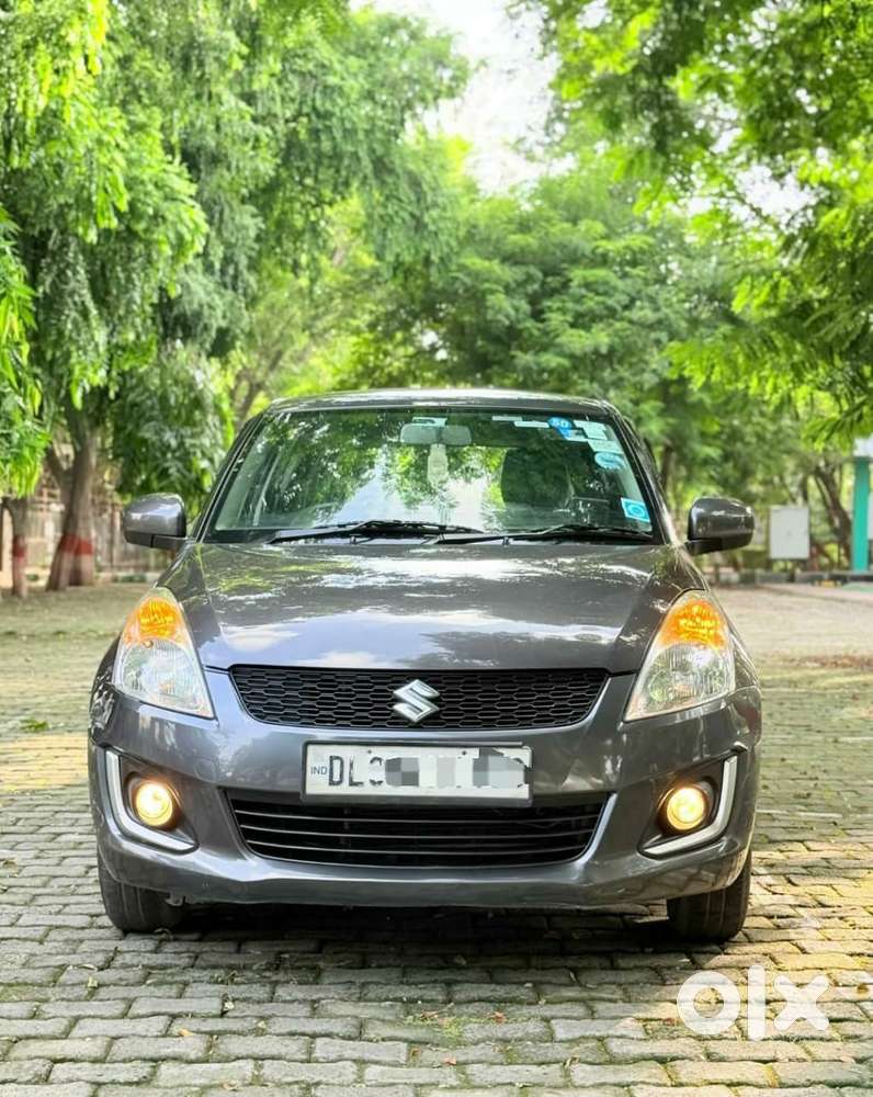 Maruti Suzuki Swift LXI Optional-O, 2017, Petrol