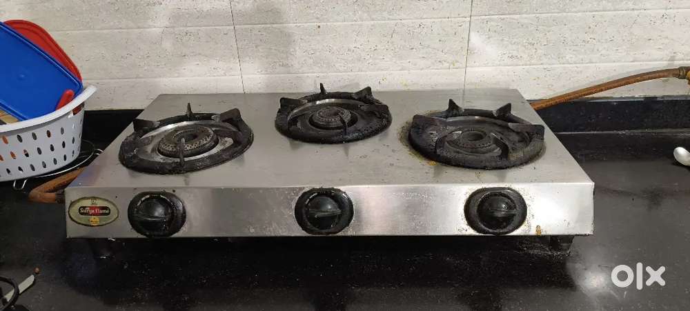 Surya flame , 3 burner gas stove/ oven. Very good condition.