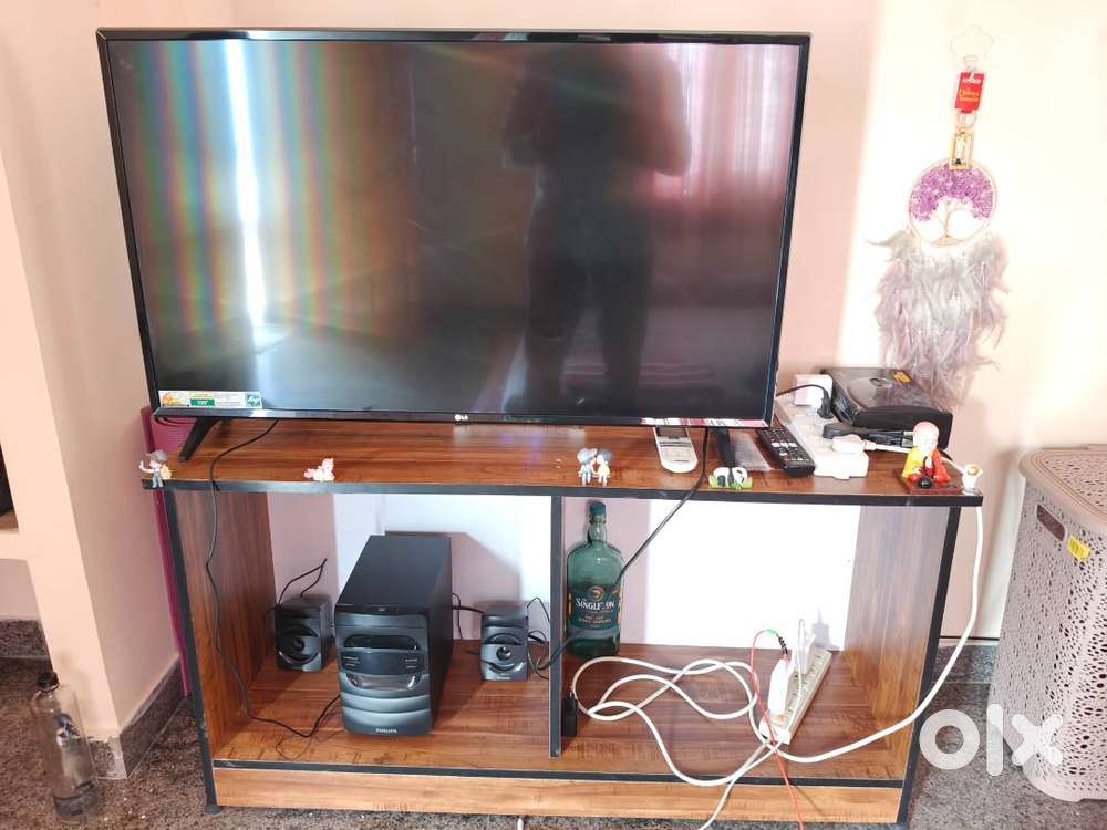 LG 43 tv, philips speaker and TV stand