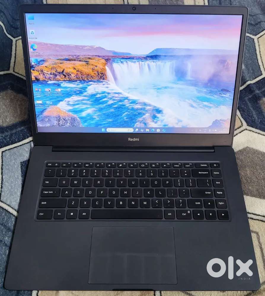 Redmi laptop, i5 11th gen, 8gb ram, 512gb ssd, 3-4 hrs battery backup.