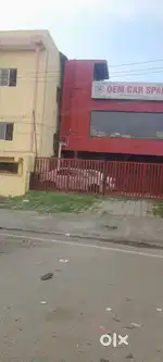 Land with building, rental income sale 100000