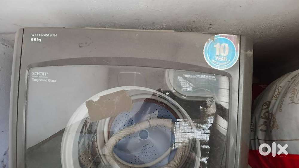 Godrej fully automatic washing Mashine with top load in new condition