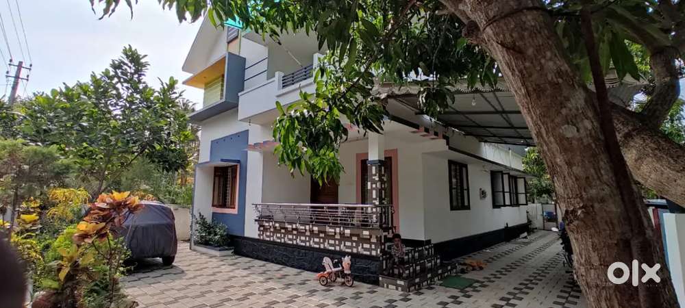 7 cent square plot with 1680 sqft 2 story 4 bhk house