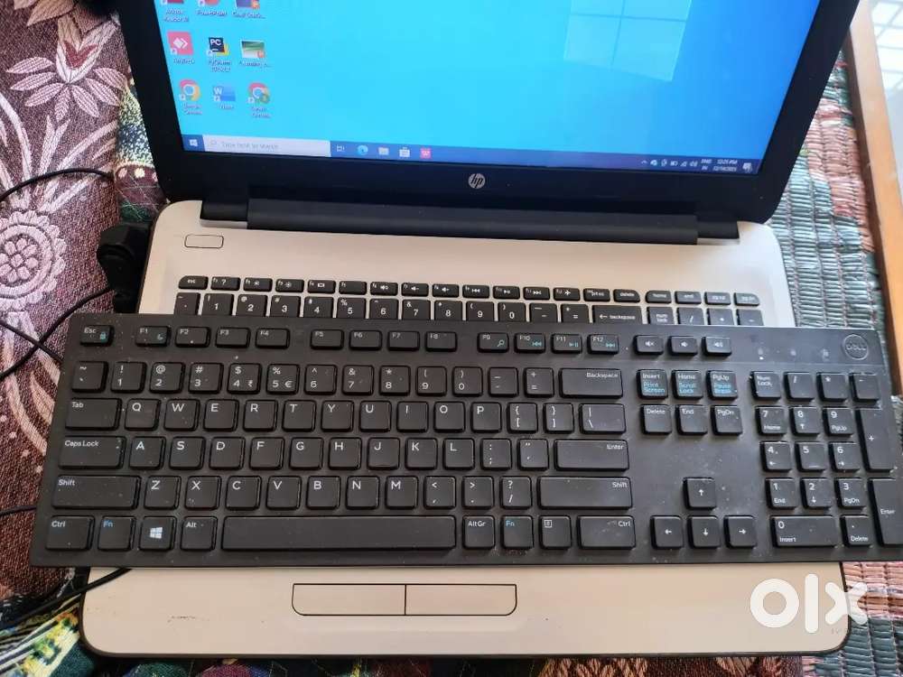 HP laptop, laptop charger, keyboard, mouse