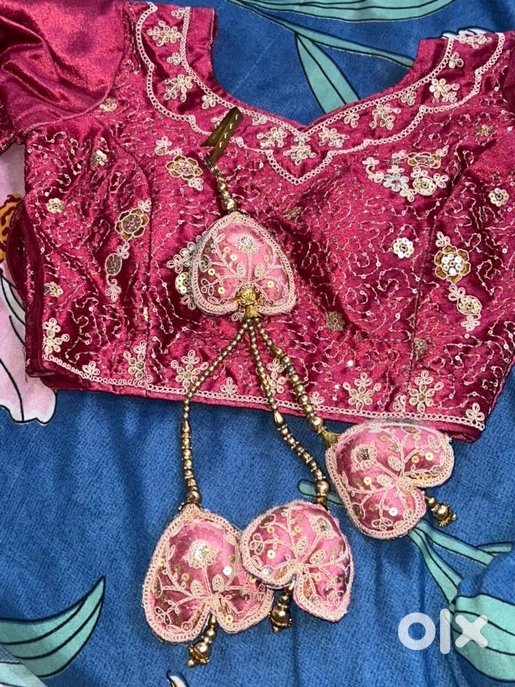 Pink velvet lehnga in contrast