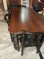3 seater sofa(1). 1 seater sofa (1) wooden dinning table (1)