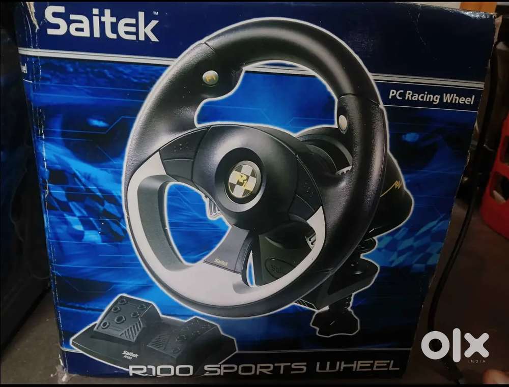 Rare edition Saitek steering wheel with break pedel