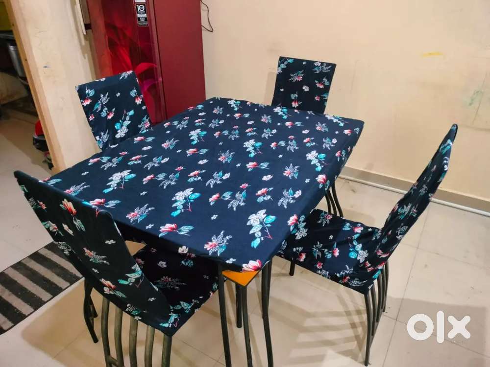 Glass Dining table and 4 cool chairs