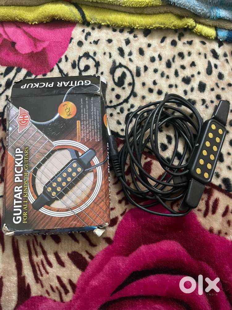 Guitar pickup for acoustic guitars