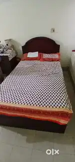 Double size cot with bed for sale