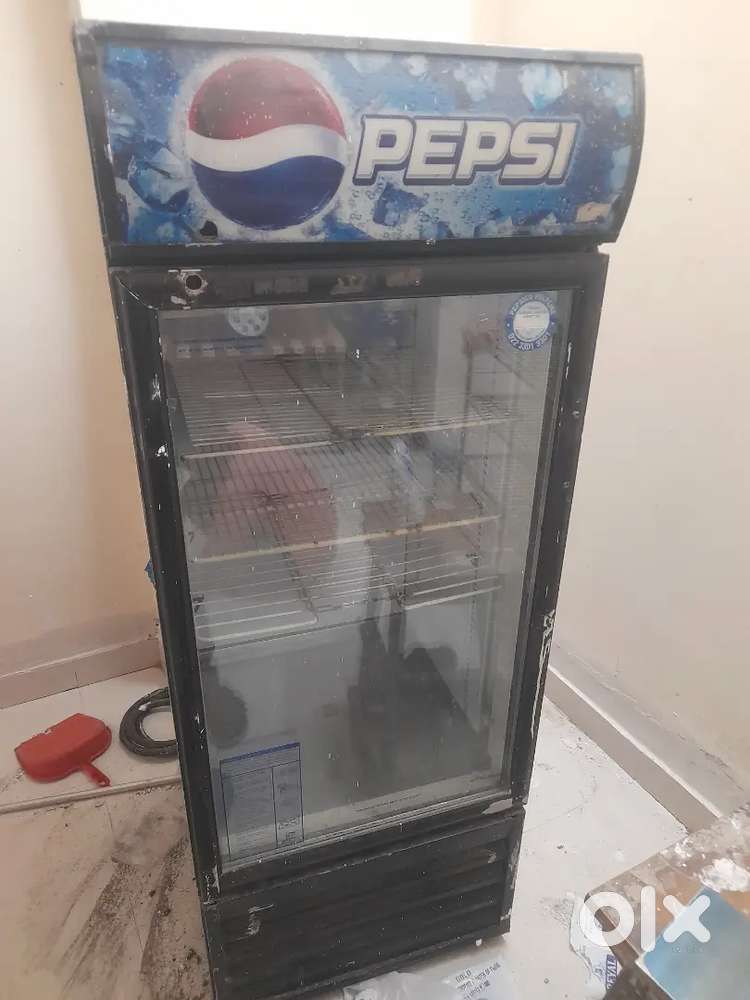 Good condition fridge an stand an table