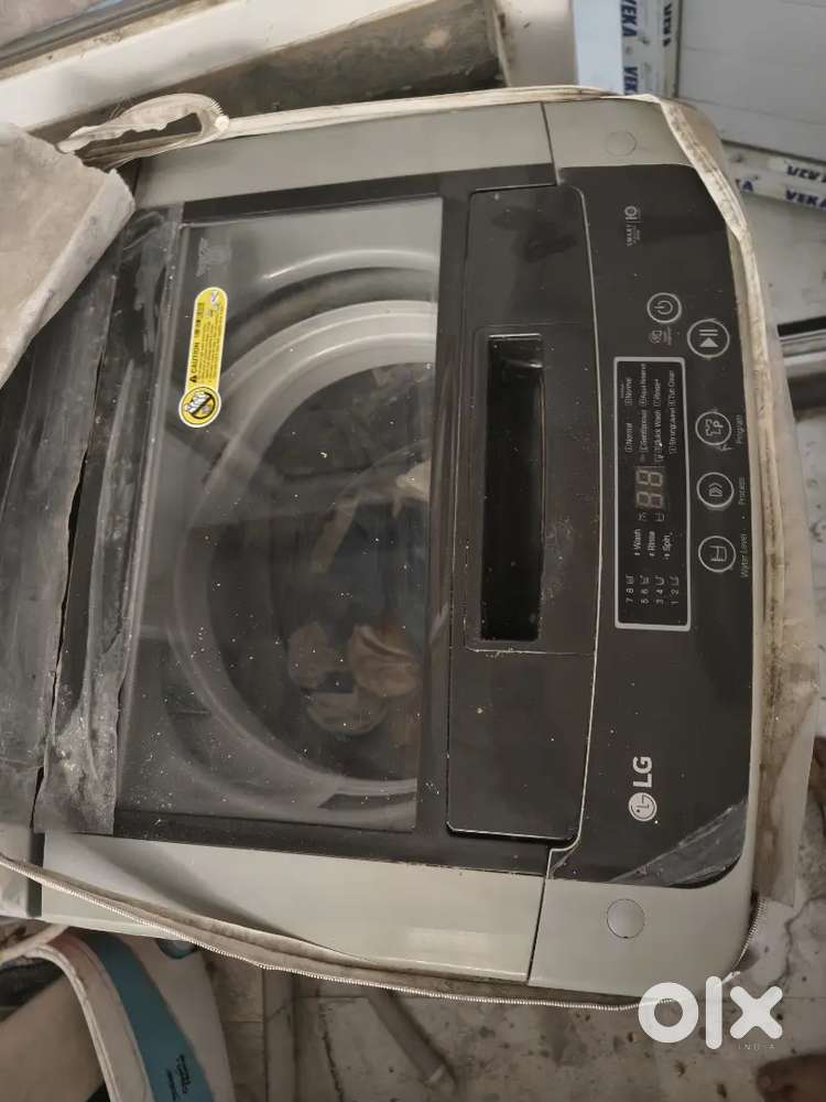 Lg automatic washing machine + 4 wheel adjustable stand + cover