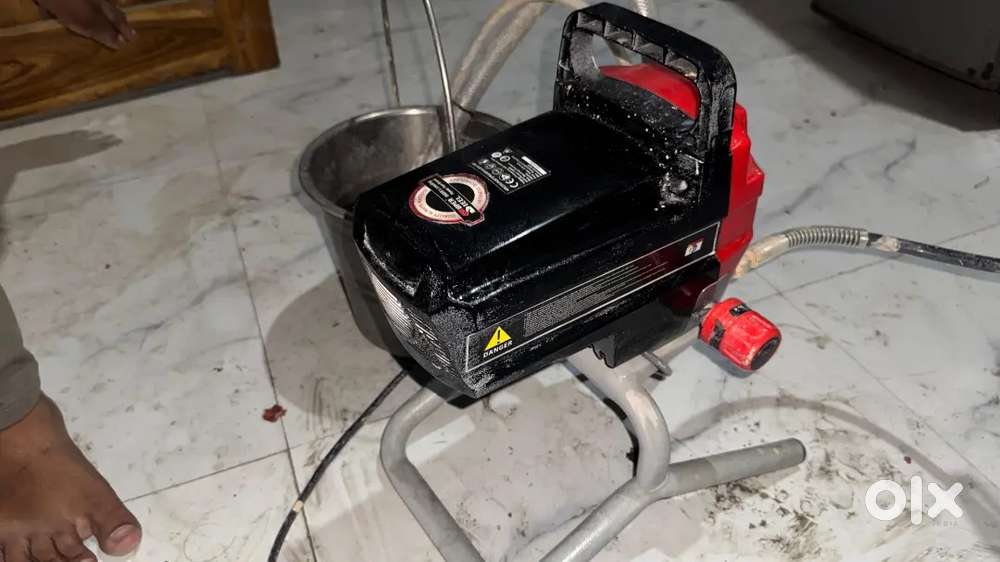 Spray painting machine