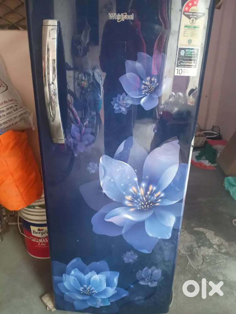 The whirlpool blue 207 l regrigerator for sale with bill and stand