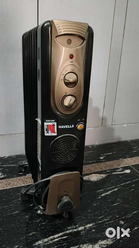 Room heater : Havells 9 fin oil filled radiator