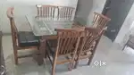 Stylish and modern 6-seater dining table made with premium glass