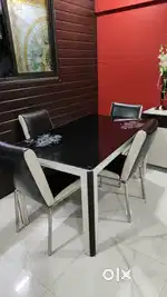 Make your meals special with this elegant 4 seater dining table