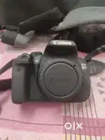 Canon 700D DSLR camera with memory card