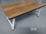 Folding bed table