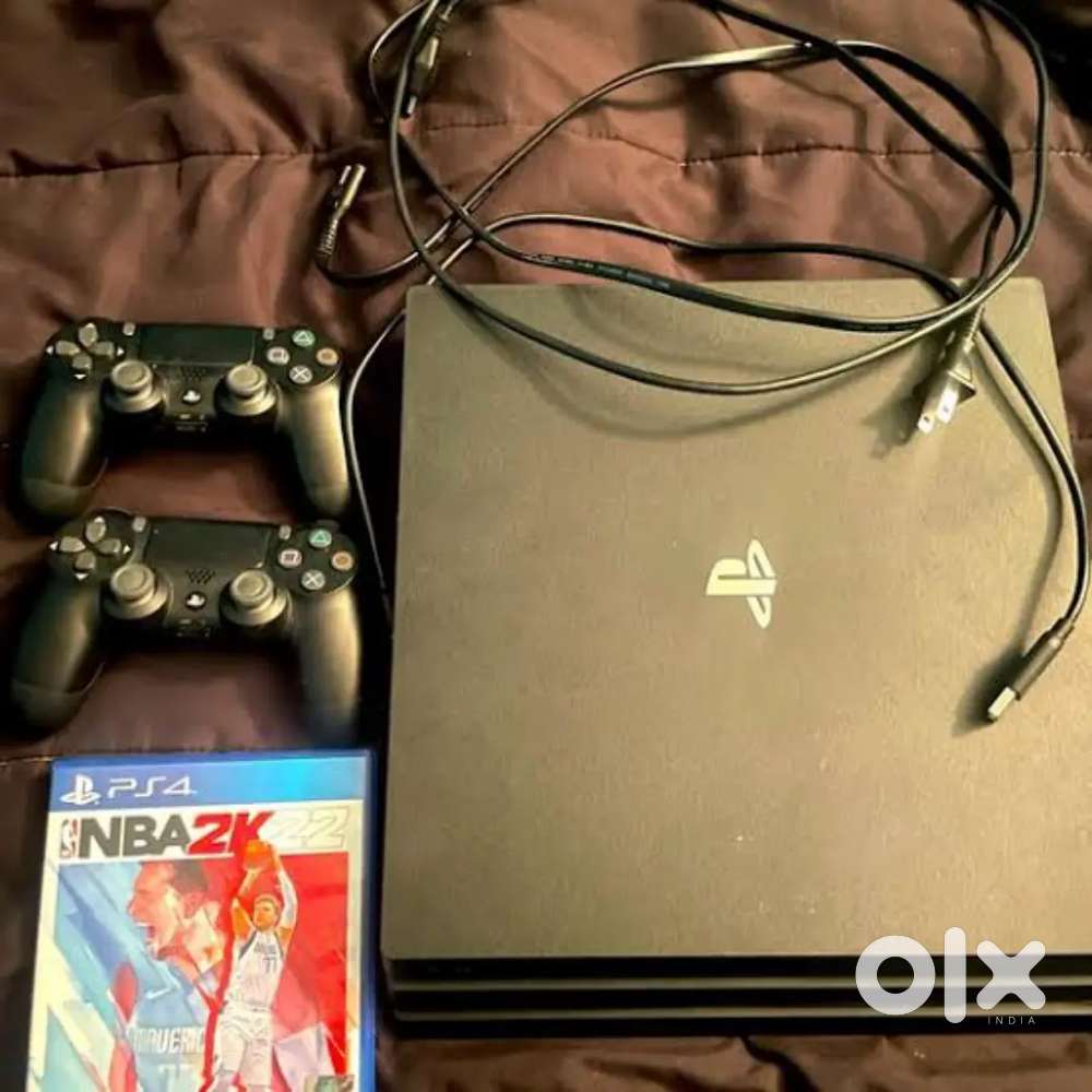 PS4 Pro (1TB) – Excellent Condition  2 Controllers  8 Games Included