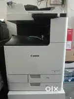 Canon 2725 with trolly a one condition new machine