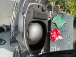 It has 125 cc engine and a metal body