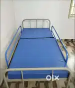 Surgical bed with mattress