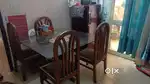 Dining table with two chair cost 6000 and without chair cost 4000