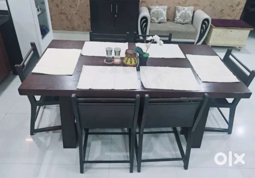 Dinning table and chairs from Livspace