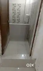 Big room attached latrin bathroom with bed fan