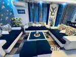 It is 7 seater sofa in2.2.3 format with 2 puffy and a center table