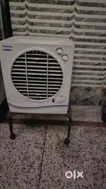 Symphony Jumbo Jr. cooler with iron stand in working condition.