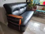 Three seater wooden sofa