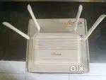 Syrotech G/EPON ONT WiFi Router with Power Adapter – Good Condition
