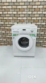 LG TROM 6.5kg front load washing machine with shippingnt.