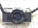 CANON AE- 1 CAMERA,  ZOOM LENS, LENS KIT