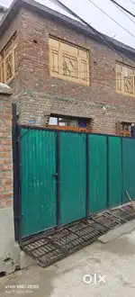 A double stroy house with 4.5 Marla Milkiyat land