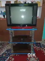 Box Colour TV along with holding stand for sale