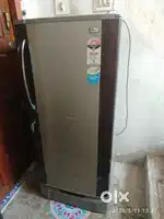 LG FRIDGE AND DINNING TABLE GOOD CONDITION