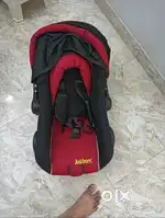 Brand new baby carrier in car