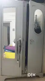 Iron bed with trolley and godrej double door metal cupboard