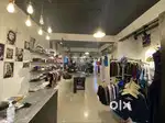 Sales man in clothing store.