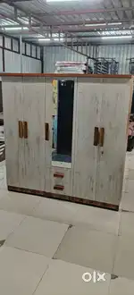Brand new 5 door wardrobe with mirror locker and hanging rods