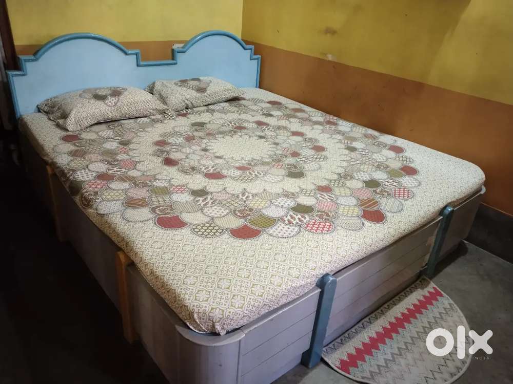 Large size box bed with mattress.