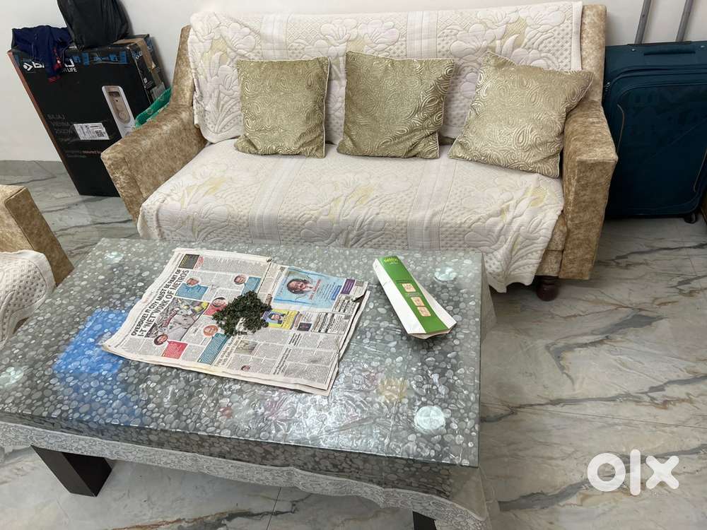 Sofa and centre table with below storage in the center table