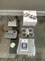 DJI Neo Fly More Combo Palm-Sized Drone with 3 Batteries used