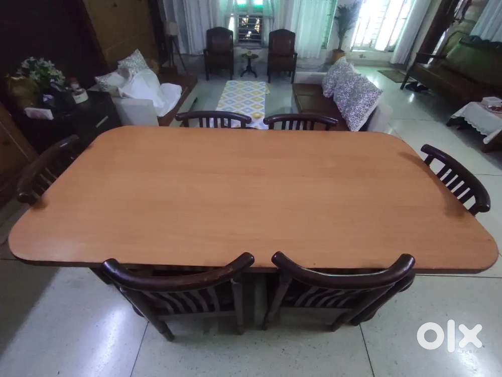 6 seater teakwood dining table with chairs