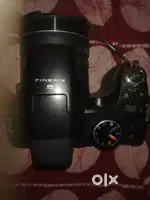 Nikon 300 mm prime tele lens and Fujifilm superzoom camera.