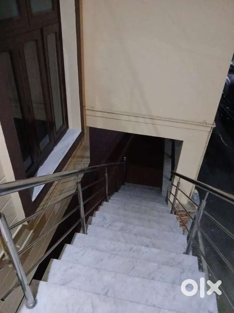 A room with latebath and kitchen