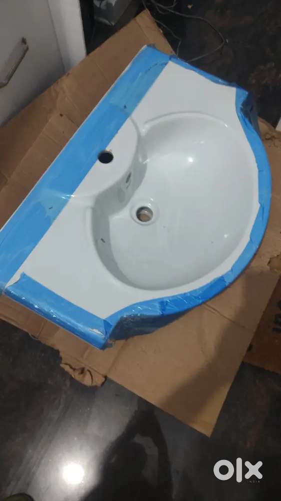 Parryware ceramic washbasin with tap